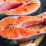 raw salmon on a cutting board