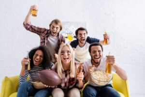 group of friends watching football game