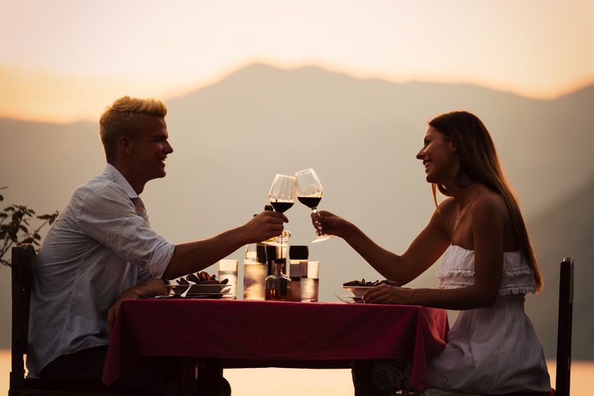 young couple enjoying valentine's day dinner