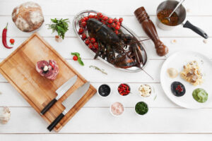 Ingredients for cooking, raw food, flat lay. Top view on products, prepared for making mediterranean meal, white wooden background. Italian cuisine, culinary classes, restaurant kitchen concept
